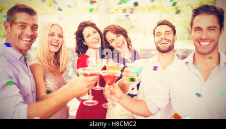 Image composite de portrait of friends having cocktail Banque D'Images