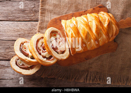Venezuelan Christmas Pan de jamon close-up on the table. horizontal view from above Banque D'Images
