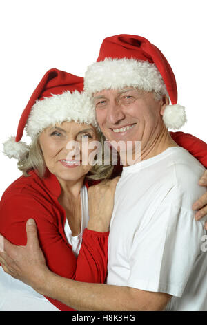 Senior couple in Santa hats Banque D'Images