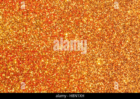 Paillettes or brillant arrière-plan. Texture étincelaient de fête Banque D'Images