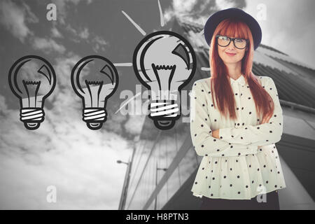 Image composite de hipster portrait of a smiling woman with arms crossed Banque D'Images