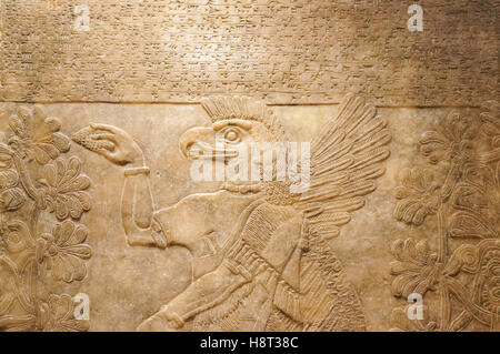 Relief du palais d'Assurnazirpal II à Nimrud, albâtre 875-860 avant J.-C., Musée National du Danemark à Copenhague, Danemark Banque D'Images