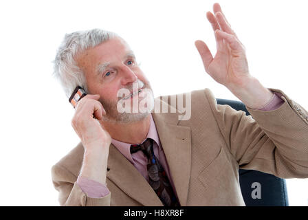 Senior businessman on a mobile phone Banque D'Images