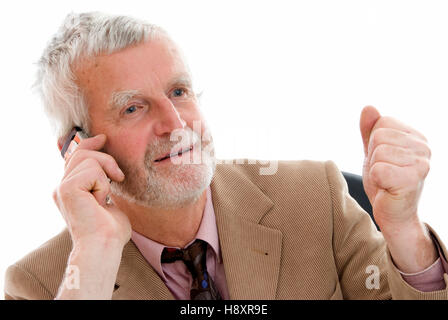 Senior businessman on a mobile phone Banque D'Images