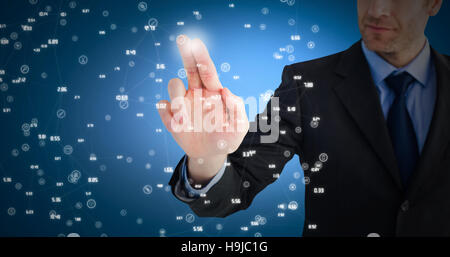 Image composite de businessman ces doigts at camera Banque D'Images