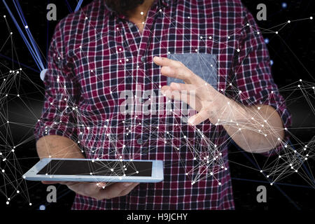 Image composite de mid section of man gesturing tandis que holding digital tablet Banque D'Images