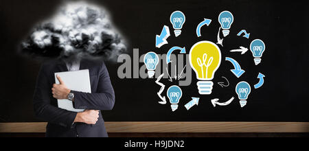 Image composite de mid section of businessman holding computer Banque D'Images