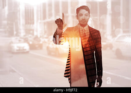 Image composite de stern asian businessman Banque D'Images