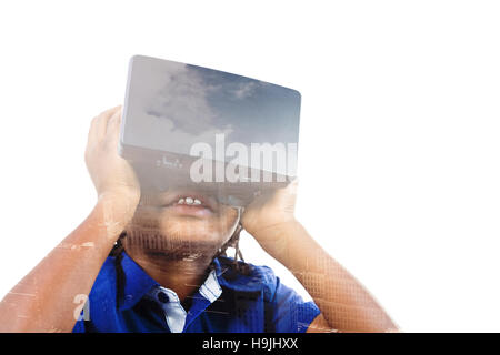 Image composite de boy wearing simulateur de réalité virtuelle Banque D'Images