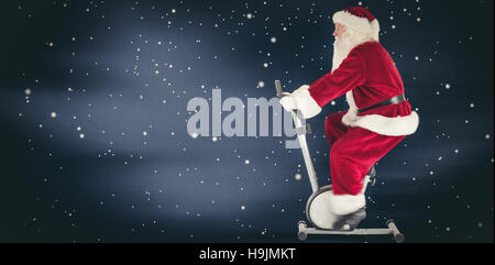 Image composite de santa utilise un home trainer Banque D'Images