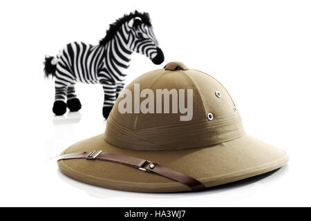 Pith helmet avec zebra peluche jouet Banque D'Images