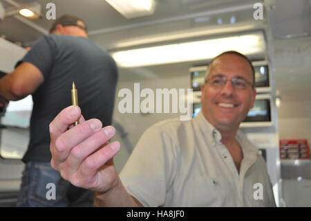 Le marquage de masse est une technique de gestion de la faune utilisée pour suivre les populations et la santé des espèces, appliquée dans les parcs nationaux des États-Unis à des fins de conservation et d'études écologiques. Banque D'Images