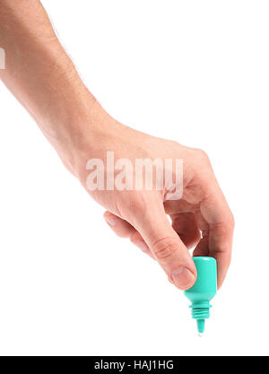 La main avec eye drop bottle Banque D'Images