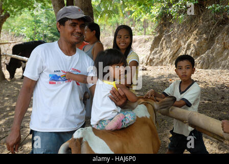 Groupe familial, Jungle, Lawigan, San Joaquin, Iloilo, Philippines. Banque D'Images