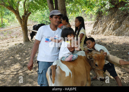 Groupe familial, Jungle, Lawigan, San Joaquin, Iloilo, Philippines. Banque D'Images