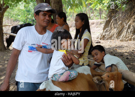 Groupe familial, Jungle, Lawigan, San Joaquin, Iloilo, Philippines. Banque D'Images