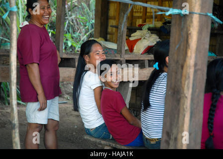 Quatre femmes, Lawigan, San Joaquin, Iloilo, Philippines. Banque D'Images