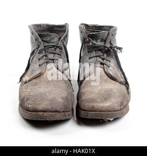 Old dirty boots isolé sur fond blanc Banque D'Images