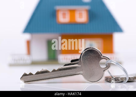 Touches et house, concept de l'achat de nouveaux biens immobiliers Banque D'Images