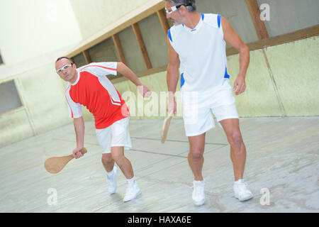 Men playing sports de raquette Banque D'Images