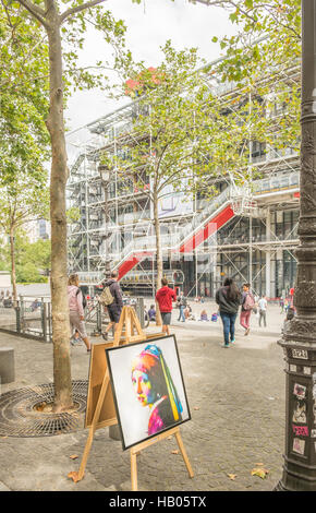 Street art version de  fille avec perle  par Jan Vermeer sur un chevalet en face du centre Georges Pompidou Banque D'Images