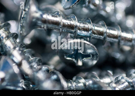 Macro Close Up vis en argent. Motif de fond. Banque D'Images