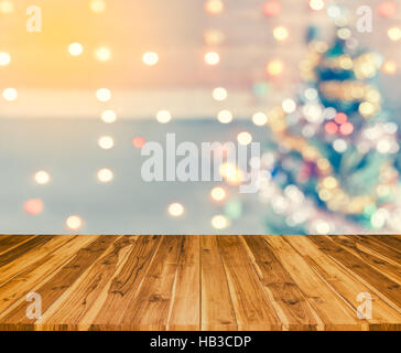 Greething le meilleur de noël vacances d'hiver. La planche en bois avec sparkle blur bokeh pour thème de Noël adapté aux contexte Banque D'Images