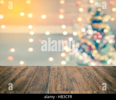 Greething le meilleur de noël vacances d'hiver. La planche en bois avec sparkle blur bokeh pour thème de Noël adapté aux contexte Banque D'Images