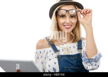 Belle blonde middle-aged woman with tablet Banque D'Images