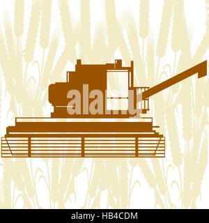 Les machines agricoles. Moissonneuse-batteuse, sur fond d'épis de céréales. Banque D'Images