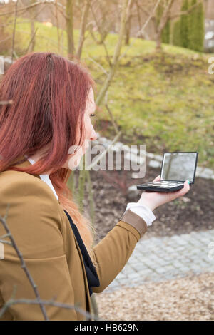 Femme avec miroir Banque D'Images