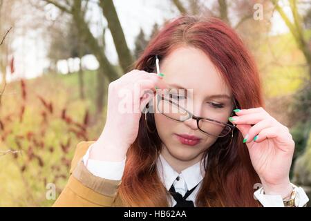 Lunettes femme met sur Banque D'Images