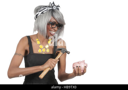 Woman holding piggy bank Banque D'Images