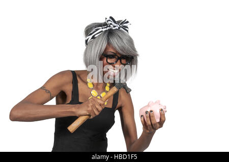 Woman holding piggy bank Banque D'Images