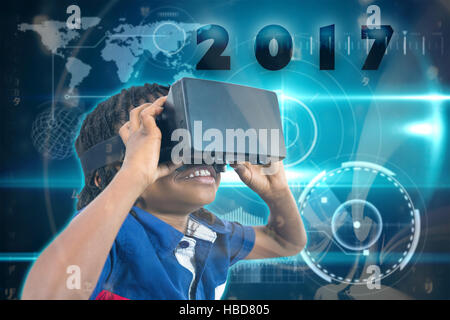 Image composite de boy wearing simulateur de réalité virtuelle Banque D'Images
