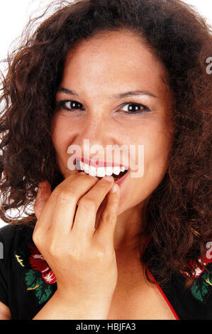 Femme de mordre ses ongles. Banque D'Images