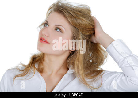 Fille dans une chemise blanche jusqu'à isolé Banque D'Images