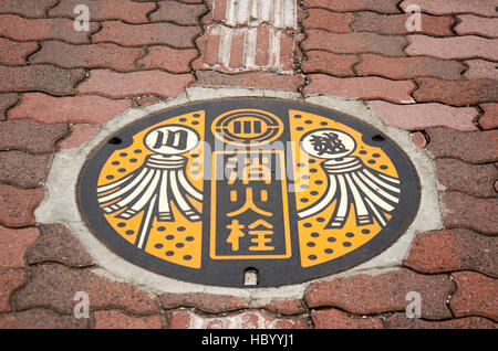 Art design symbole de la ville de Saitama sur couvercle de trou d'au sentier à côté road le 19 octobre 2016 à Saitama, Japon Banque D'Images