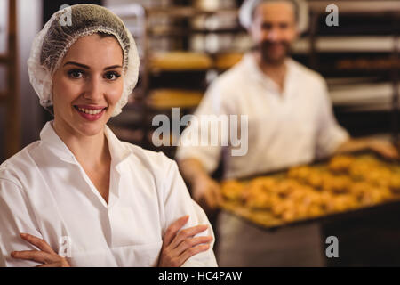 Portrait of female baker smiling Banque D'Images