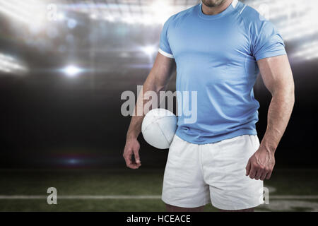 Image composite de rugby player looking at camera Banque D'Images