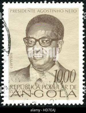 ANGOLA - circa 1976 : timbre imprimé en Angola présente le président Agostinho Neto, vers 1976 Banque D'Images
