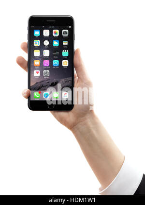 Woman hand holding Apple iPhone 7 smartphone plus isolé sur fond blanc Banque D'Images