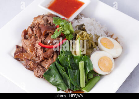 Stew cuisse de porc avec du riz Banque D'Images