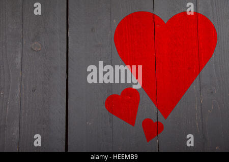 Illustration de cœur rouge sur fond de bois Banque D'Images
