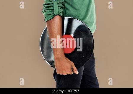 African Man Holding disc-jockey vinyle Concept Musique Banque D'Images