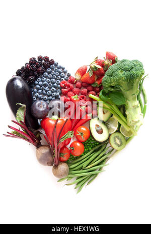 Heartshape fruits et légumes avec différents groupes de couleur Banque D'Images