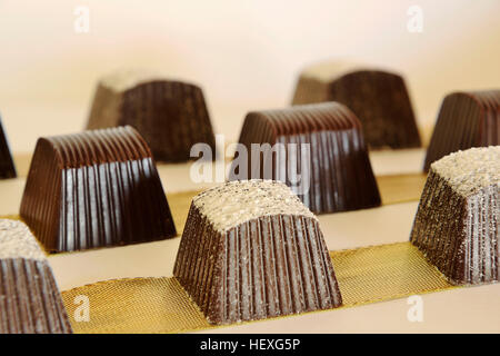 Chocolats en ligne Or Banque D'Images