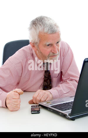 Plus businessman working on laptop Banque D'Images