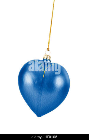 Blue heart-shaped Christmas ornament on golden thread Banque D'Images