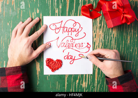 L'écriture d'un homme asiatique calligraphie Valentines Day card Banque D'Images